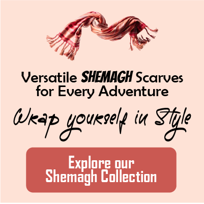 A variety of colorful shemagh scarves displayed on a green background.